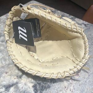 Left hand first base mitt. Brand new. 12.50 in.